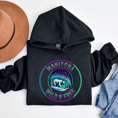 Embrace the power and beauty of the north with our Manitoba – Wild & Free hoodie, featuring a bold graphic of a polar bear beneath the awe-inspiring northern lights.
